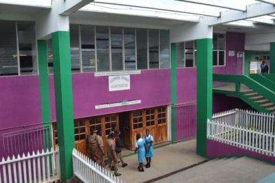 Students at William Knibb High School socializing in the hallways. 