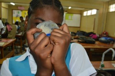 Mangrove Disease - student showing of petri plate