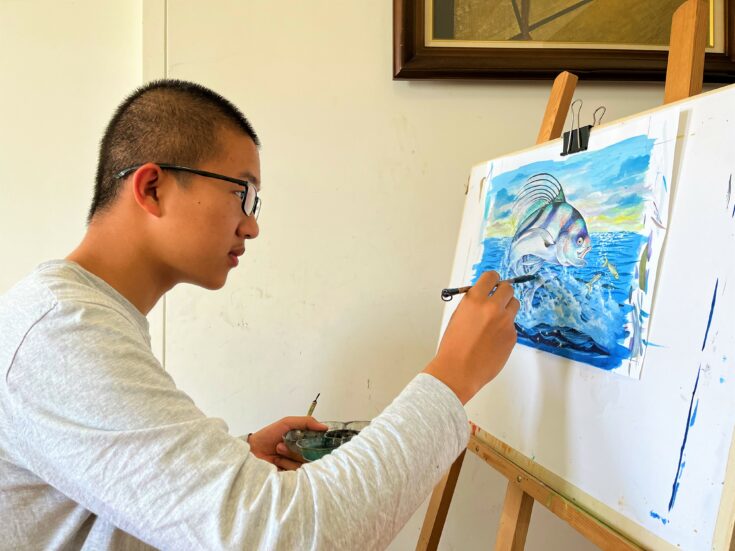 Yanjun Mao creating art