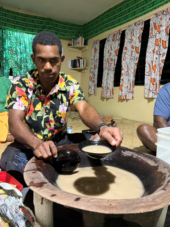 Members of the Rukua village gather during a sevu sevu and share kava. The larger bowl is called the tanoa and the small bowls are called bilo.