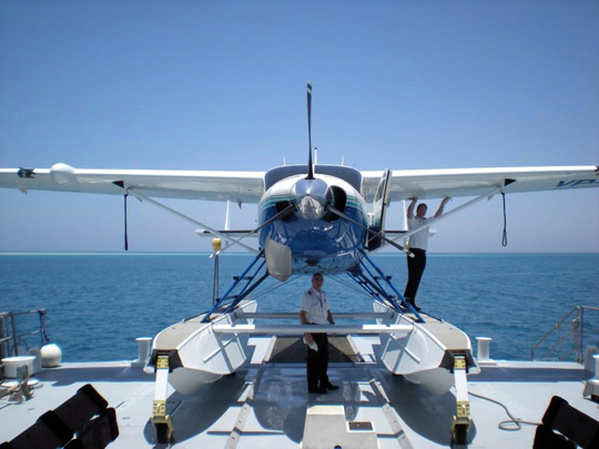 Golden Eye seaplane on the stern elevator of the Golden Shadow Golden Eye seaplane on the stern elevator of the Golden Shadow