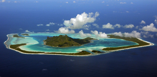 Maupiti is one of the classic coral atolls with a volcanic island in the center, and a deep lagoon enclosed within a coral reef. Maupiti is one of the classic coral atolls with a volcanic island in the center, and a deep lagoon enclosed within a coral reef.