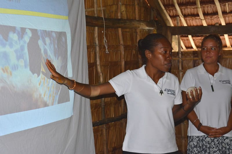 Solomon Islands Fisheries Officer presents information about coral reefs.